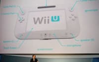 家庭用ゲーム機の新製品「Wii U」を発表する任天堂の岩田聡社長(7日、米ロサンゼルス)