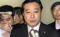 野田財務相は円売り介入の実施を公表した(4日午前、財務省)=共同