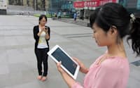 iPhoneやiPadなどでミニブログを利用する若者が増えている(北京市)