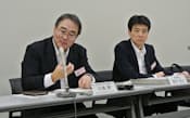 12年4～6月期決算を発表するNECの川島勇CFO（写真左、31日、東証）