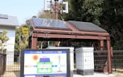 NTTドコモが自社施設内に設置した、太陽光発電パネルを備えた実験用の携帯電話基地局