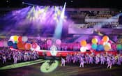 東京国体「スポーツ祭2013」が開幕。28日の総合開会式は2020年の東京五輪決定を祝うムードに包まれた(東京都調布市)