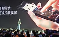 北京小米科技のスマホが価格破壊の引き金を引いたとの指摘も（2013年09月に北京で開いた新製品発表会）