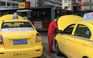 中国の重慶市は、中国が報復関税をかけた天然ガスを燃料とするタクシーが多い