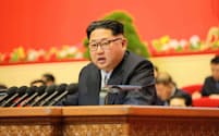 7日、北朝鮮の朝鮮労働党大会2日目で、報告を行う金正恩第1書記=朝鮮中央通信・共同
