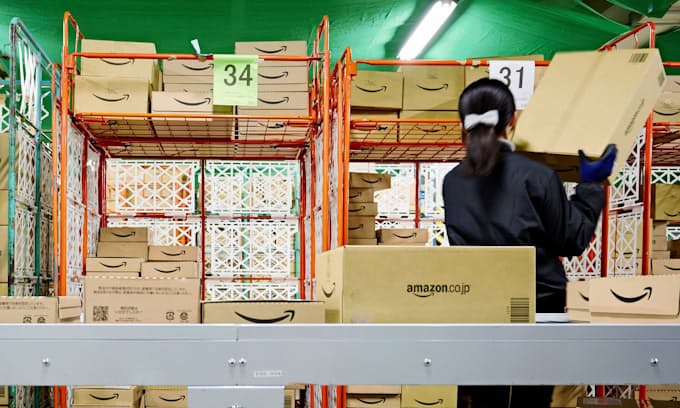 アマゾン送料上げ プライム への誘導狙う 日本経済新聞