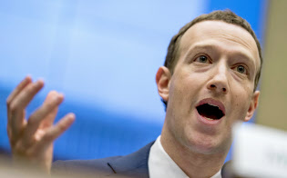4月11日、米下院公聴会に臨んだフェイスブックのザッカーバーグCEO=AP 4月11日、米下院公聴会に臨んだフェイスブックのザッカーバーグCEO=AP