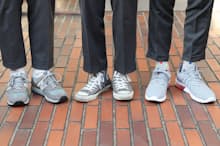 （左から）ニューバランス、コンバース、ナイキのスニーカーをビジネススタイルのパンツに合わせてみる。パンツの丈は短めが鉄則