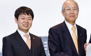 大山健太郎会長（右）と晃弘社長