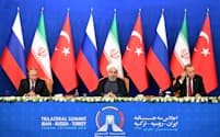 イラン、ロシア、トルコの首脳は7日、テヘランでシリア問題を協議した=ロイター