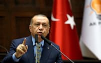 10月、記者殺害を批判するトルコのエルドアン大統領=ロイター