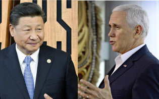APECに出席したペンス米副大統領(右)と中国の習近平国家主席=AP APECに出席したペンス米副大統領(右)と中国の習近平国家主席=AP