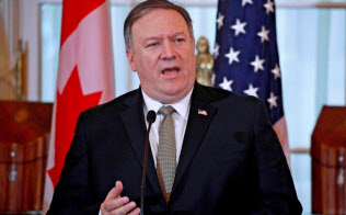 記者会見するポンペオ米国務長官(14日)=ロイター 記者会見するポンペオ米国務長官(14日)=ロイター