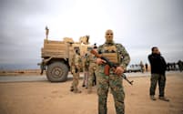 シリア北東部に展開する米軍兵士ら（2018年11月）=ロイター