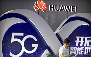 ファーウェイは次世代通信規格「5G」のインフラビジネスを世界展開している=AP ファーウェイは次世代通信規格「5G」のインフラビジネスを世界展開している=AP