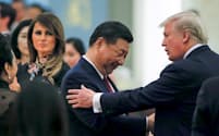 中国企業のトップらは、中国に改革を要求するトランプ大統領（右）は長い目で見れば、中国にとって「最良の友」になると見ている=ロイター