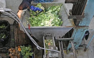 日本フードエコロジーセンターで処理される食品廃棄物(9日、相模原市)