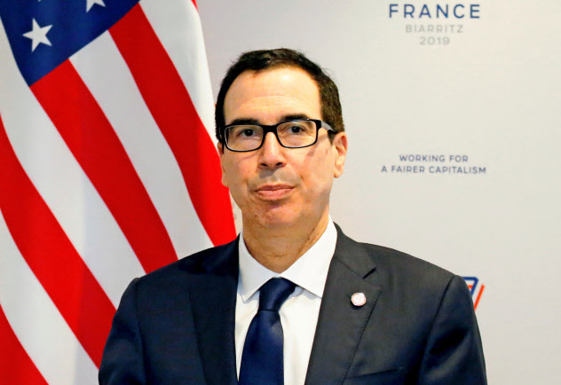 ムニューシン米財務長官はイランのウラン濃縮活動を認めない考えを強調した(18日、パリ近郊)=ロイター ムニューシン米財務長官はイランのウラン濃縮活動を認めない考えを強調した(18日、パリ近郊)=ロイター
