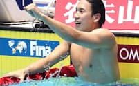 男子200メートル自由形で銀メダルを獲得し、喜ぶ松元=山本博文撮影