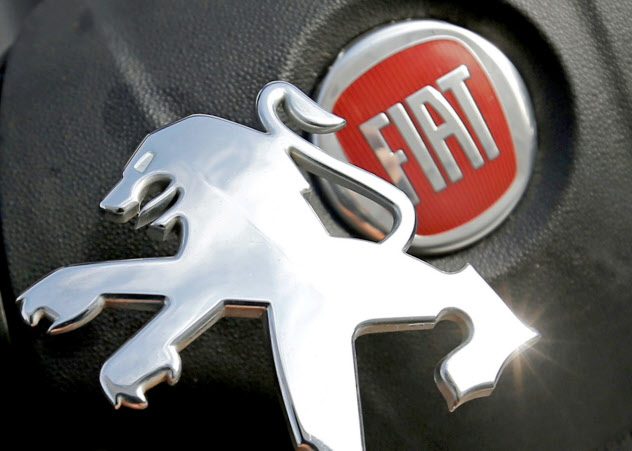 Logos of Peugeot and Fiat are seen in this illustration picture taken October 30, 2019. REUTERS/Regis Duvignau/Illustration Logos of Peugeot and Fiat are seen in this illustration picture taken October 30, 2019. REUTERS/Regis Duvignau/Illustration