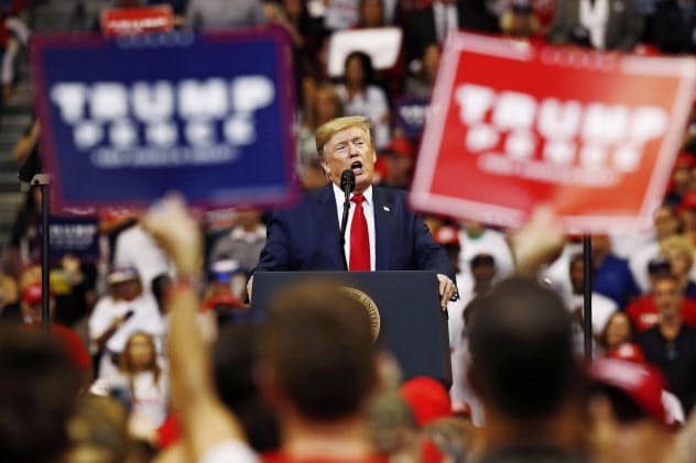 President Donald Trump speaks during a rally on Tuesday, Nov. 26, 2019, in Sunrise, Fla. (AP Photo/Brynn Anderson) President Donald Trump speaks during a rally on Tuesday, Nov. 26, 2019, in Sunrise, Fla. (AP Photo/Brynn Anderson)