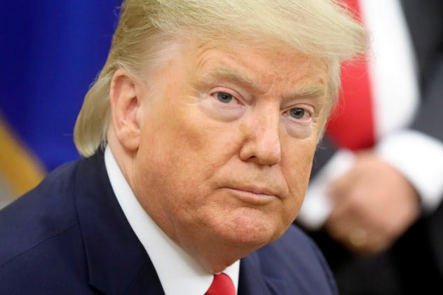 トランプ氏は金正恩氏に誕生日メッセージを送った(7日、ホワイトハウス)=ロイター トランプ氏は金正恩氏に誕生日メッセージを送った(7日、ホワイトハウス)=ロイター