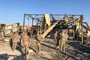 イランの弾道ミサイルを撃ち込まれたイラクのアサド空軍基地には米軍も駐留(1月13日)=ロイター イランの弾道ミサイルを撃ち込まれたイラクのアサド空軍基地には米軍も駐留(1月13日)=ロイター