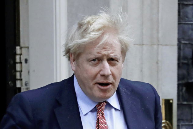 ジョンソン英首相(3月25日撮影、ロンドン)=AP ジョンソン英首相(3月25日撮影、ロンドン)=AP