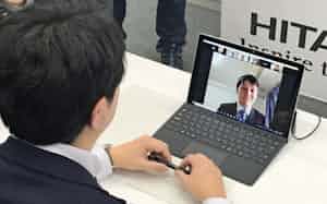 日立製作所は面接を含めた全ての選考を対面ではなくウェブ上で実施する準備を整えている(写真は同社が就活生向けに開いたウェブ座談会) 日立製作所は面接を含めた全ての選考を対面ではなくウェブ上で実施する準備を整えている(写真は同社が就活生向けに開いたウェブ座談会)