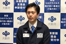 「作業衣ジャンパー」姿で取材に応じる大阪府の吉村洋文知事