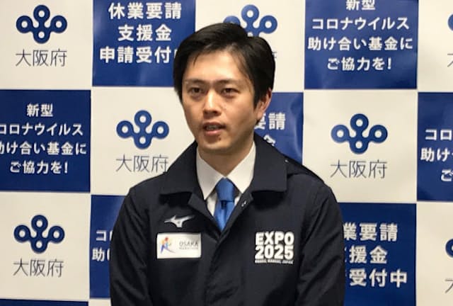 「作業衣ジャンパー」姿で取材に応じる大阪府の吉村洋文知事