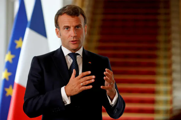 ワクチン開発のための国際会議で話すマクロン仏大統領=ロイター