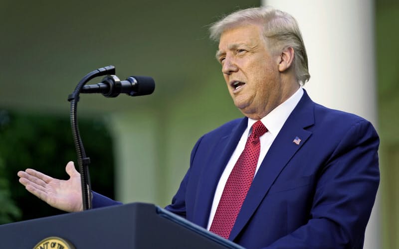 トランプ米大統領は香港自治法に署名した=AP トランプ米大統領は香港自治法に署名した=AP