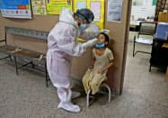 インドはコロナ感染拡大のペースが加速している=ロイター インドはコロナ感染拡大のペースが加速している=ロイター