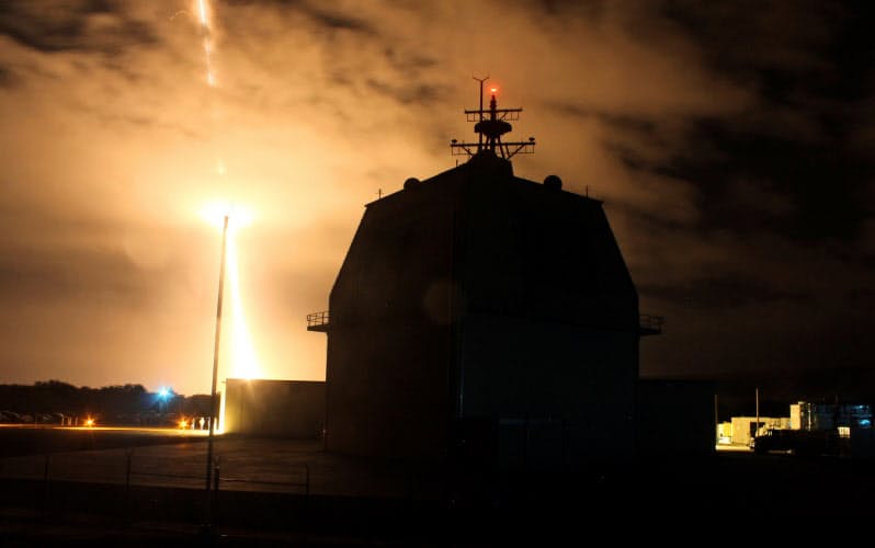 FILE PHOTO: The Missile Defense Agency conducts the first intercept flight test of a land-based Aegis Ballistic Missile Defense weapon system from the Aegis Ashore Missile Defense Test Complex in Kauai, Hawaii, December 10, 2015.  The U.S. government is considering turning the Aegis Ashore missile defense test site in Hawaii into an operational facility that would expand U.S. defenses against possible missile attacks from North Korea, according to sources familiar with the issue. Picture taken December 10, 2015.  REUTERS/U.S. Missile Defense Agency/Leah Garton/Handout via Reuters/File Photo