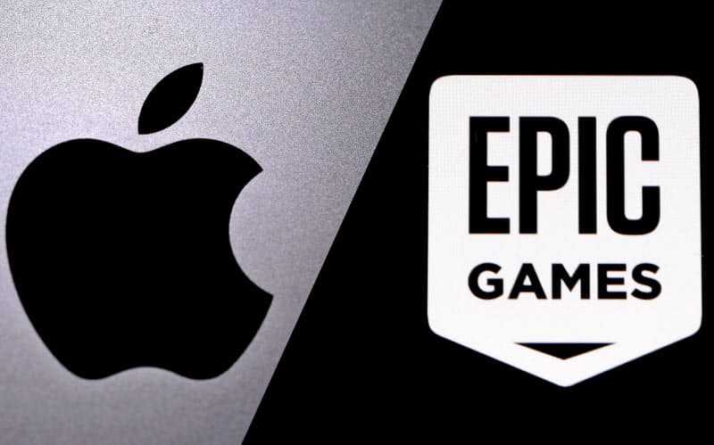 FILE PHOTO: Apple logo is seen on a Macbook in this illustration taken April 12, 2020. REUTERS/Dado Ruvic/Illustration/File Photo FILE PHOTO: Apple logo is seen on a Macbook in this illustration taken April 12, 2020. REUTERS/Dado Ruvic/Illustration/File Photo