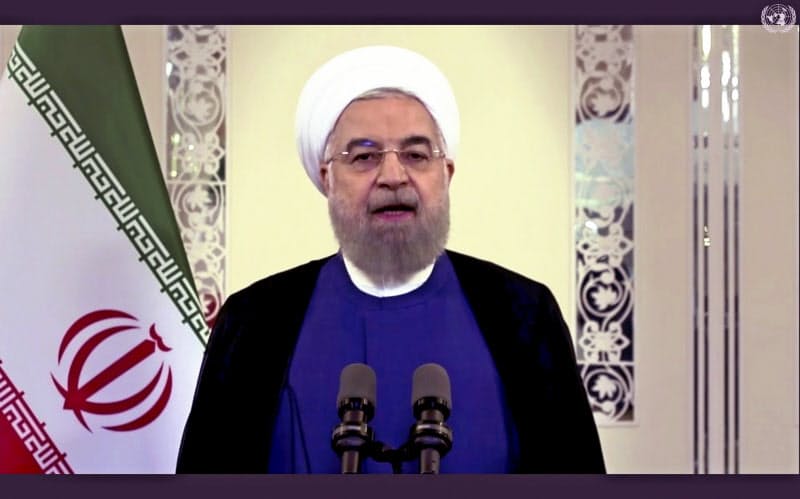 22日、国連向けにテレビ演説するイランのロウハニ大統領=AP 22日、国連向けにテレビ演説するイランのロウハニ大統領=AP