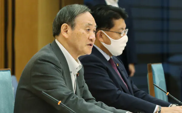 デジタル改革関係閣僚会議の初会合であいさつする菅首相(23日午前、首相官邸)