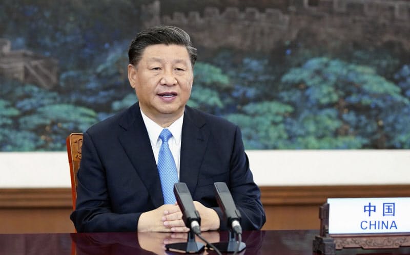 22日の国連総会一般討論で放映されたビデオで演説する中国の習近平国家主席=新華社・共同 22日の国連総会一般討論で放映されたビデオで演説する中国の習近平国家主席=新華社・共同