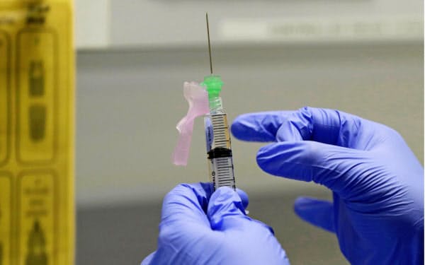 国が買い上げたワクチンは接種費用を無料とする=AP