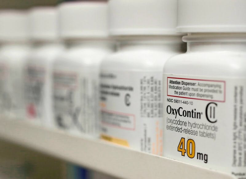 米パーデューはオピオイド系鎮痛薬の販売手法を巡り、米司法省に80億ドル超の和解金を支払う=ロイター 米パーデューはオピオイド系鎮痛薬の販売手法を巡り、米司法省に80億ドル超の和解金を支払う=ロイター