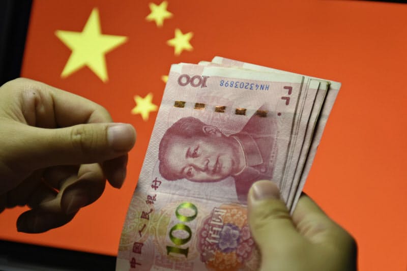 中国はデジタル通貨の発行をにらみ法制度を整備する=AP 中国はデジタル通貨の発行をにらみ法制度を整備する=AP