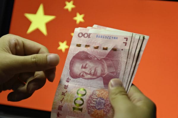 中国はデジタル通貨の発行をにらみ法制度を整備する=AP