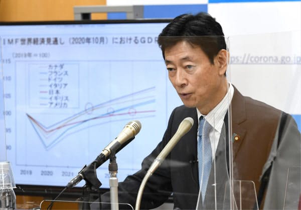 発表されたGDPの速報値について記者会見する西村経財相(16日午前、東京・永田町)