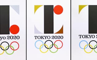 記者会見で公表された、東京五輪公式エンブレムのデザイン（左から）原案、修正案、最終案