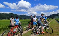 飛騨市では「里山サイクリングツアー」がサイトで評判を呼び、欧米からの訪日外国人に人気だ