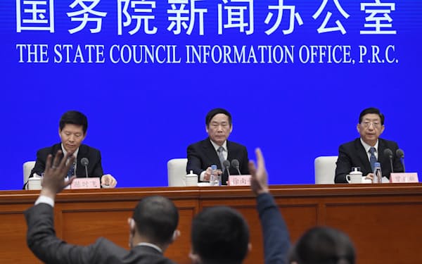 中国政府が開いた記者会見（31日、北京）=共同