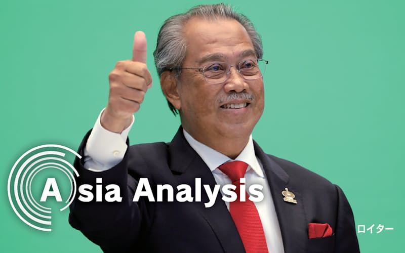 マレーシアのムヒディン首相は高速鉄道の計画変更にシンガポールの同意を取り付けられなかった=ロイター マレーシアのムヒディン首相は高速鉄道の計画変更にシンガポールの同意を取り付けられなかった=ロイター