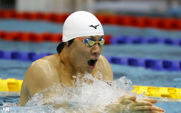  男子100メートル平泳ぎ(知的障害)予選 自らが持つ世界記録を更新した山口尚秀(21日、横浜国際プール)=共同