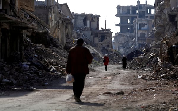 内戦で荒廃したシリアも国内情勢が安定した国とみなされていた時期もあった（2020年12月、ダマスカス郊外）＝ロイター